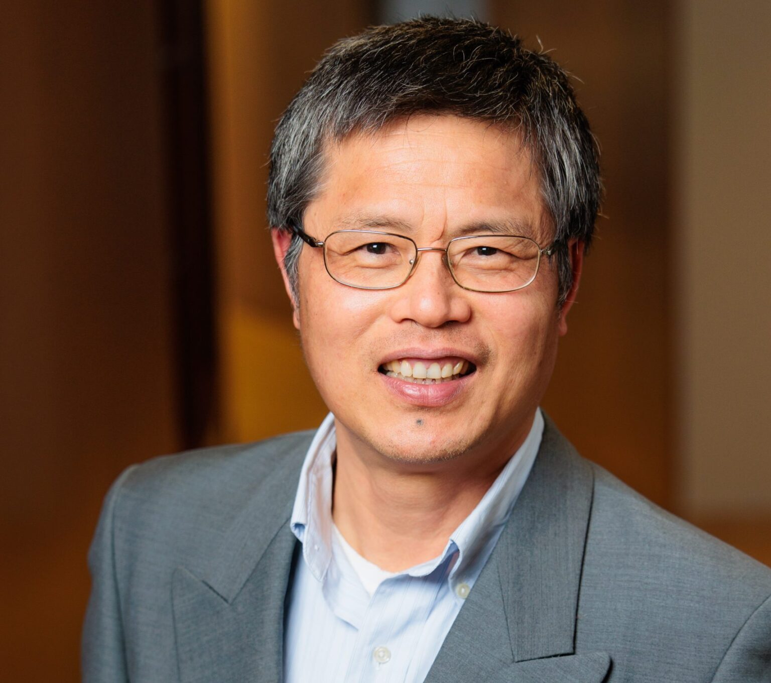 Dr. Qiao Hu